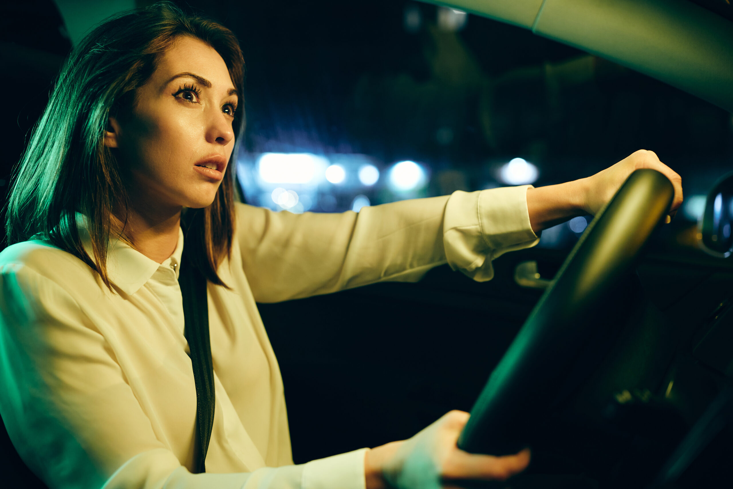 young sad woman crying while driving alone in a ca 2024 12 13 16 36 14 utc scaled